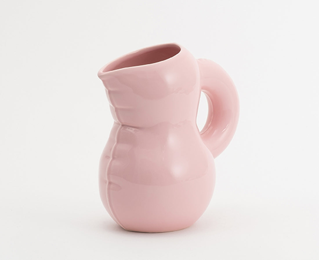 Emily Blow Up ceramic Jug in Bubblegum pink by Home Studyo with a rounded body, ribbed texture, and a curved handle.