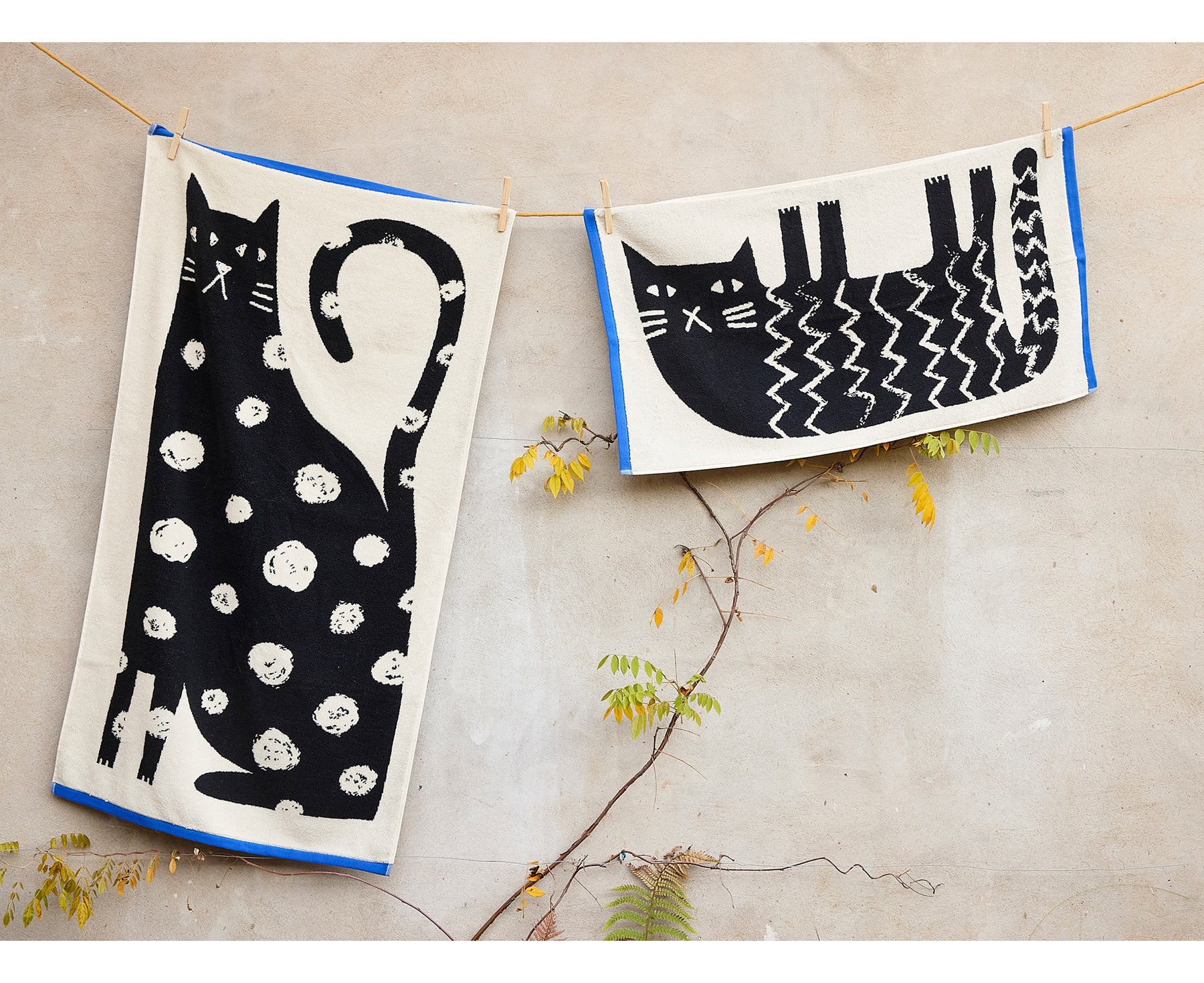 Lazy Cat Hand Towel by Donna Wilson