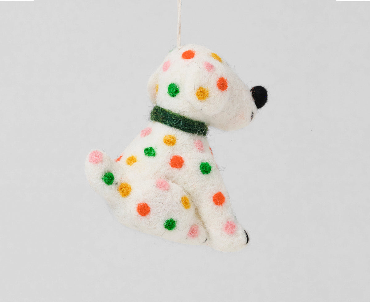 Hanging Felt chip spotted dog Ornament by Wrap viwed from the side.
