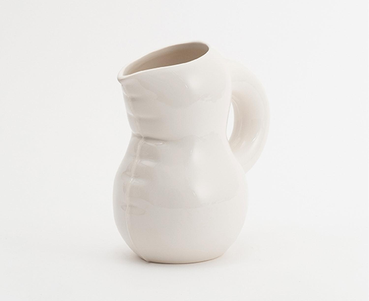 Emily Blow Up Jug in Bone by Home Studyo with a rounded, sculptural design, featuring a textured body.