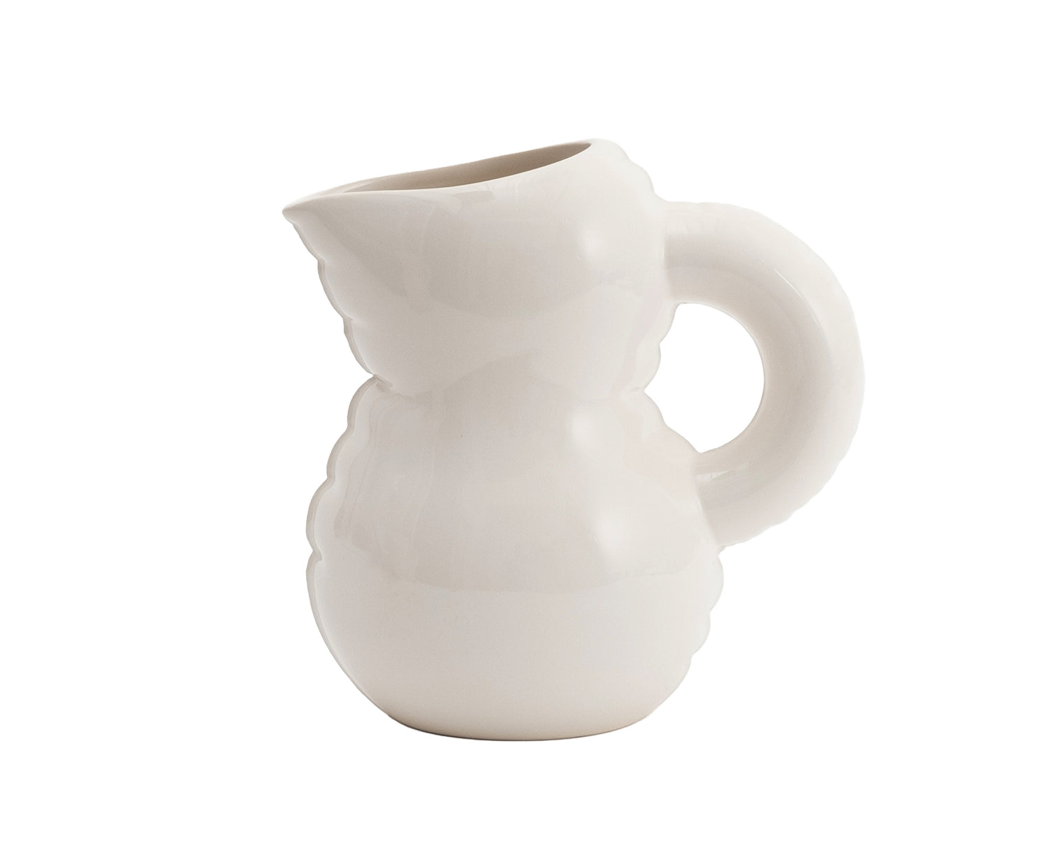 Emily Blow Up Jug in Bone by Home Studyo with a rounded, sculptural design, featuring a textured body.