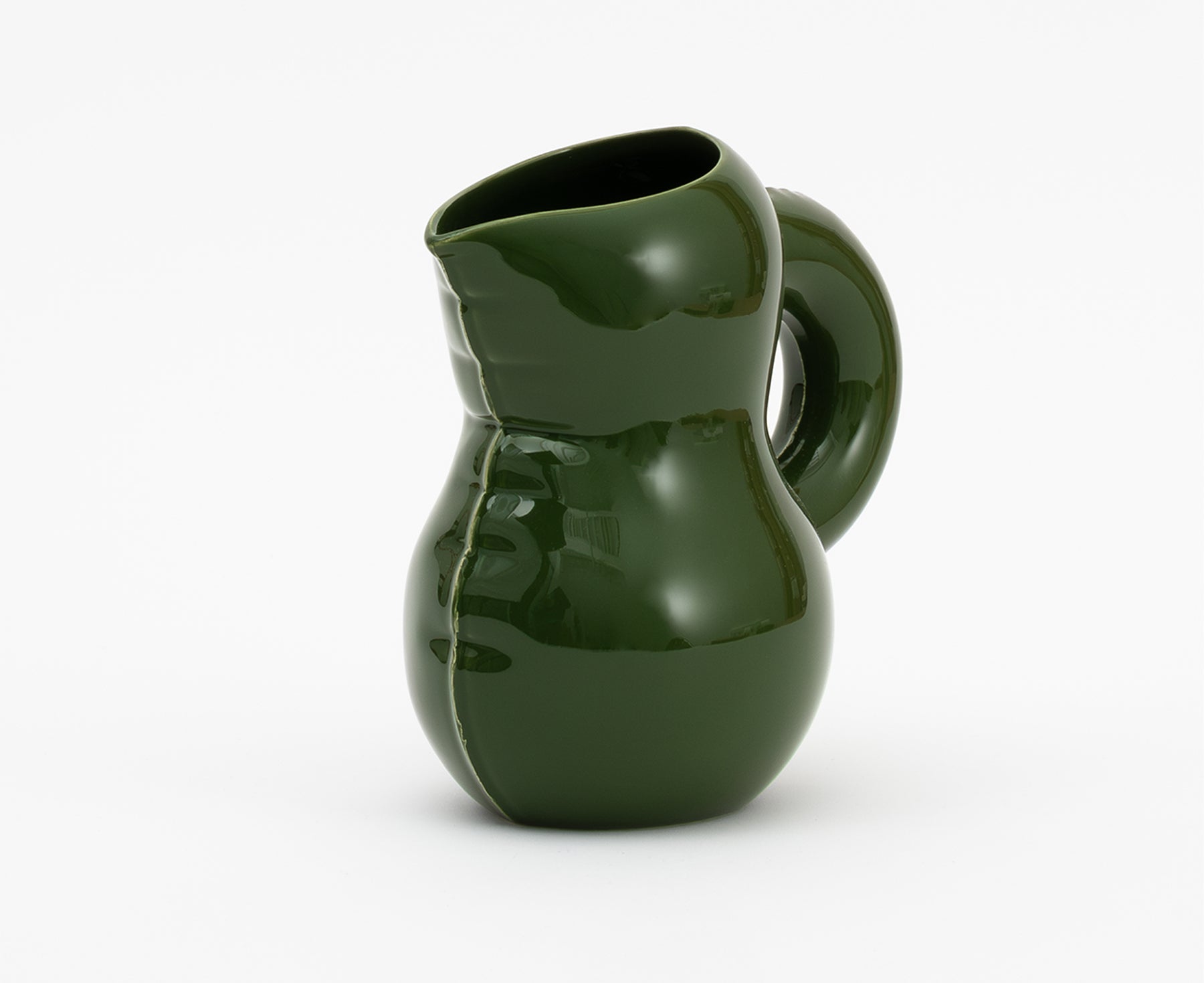 Emily Blow Up ceramic Jug in Moss Green by Home Studyo with a rounded body, ribbed texture, and a curved handle.