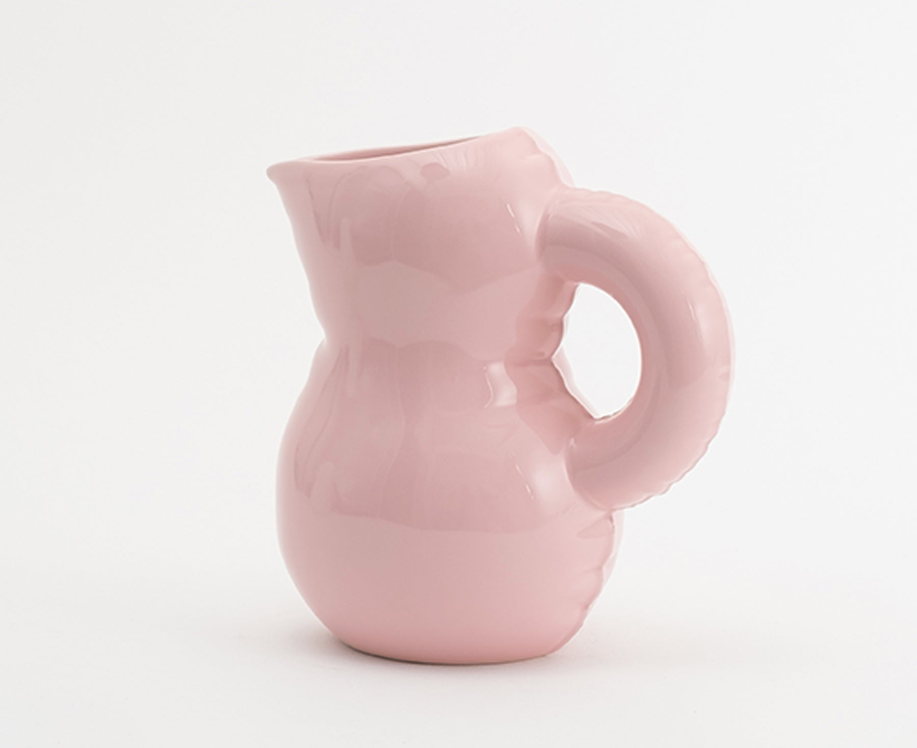 Emily Blow Up ceramic Jug in Bubblegum pink by Home Studyo with a rounded body, ribbed texture, and a curved handle.