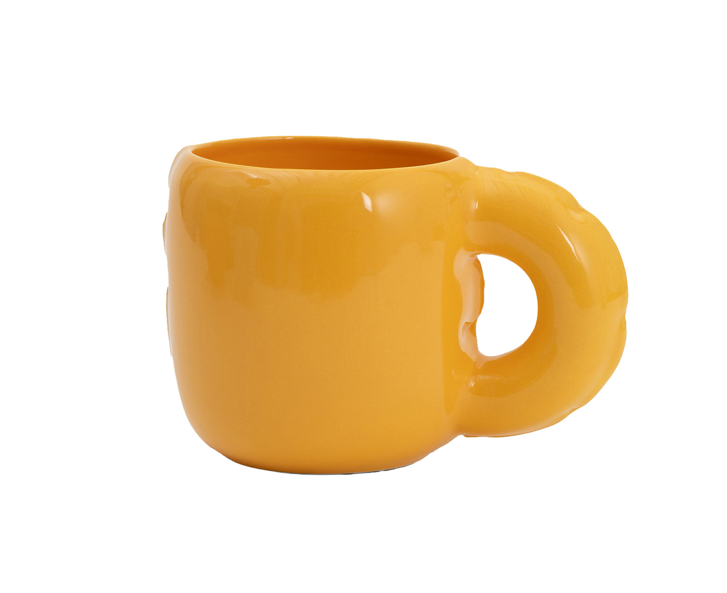 A glossy yellow ceramic Gaston Blow Up Mug by Home Studyo with a sculpted, organic handle and side details.