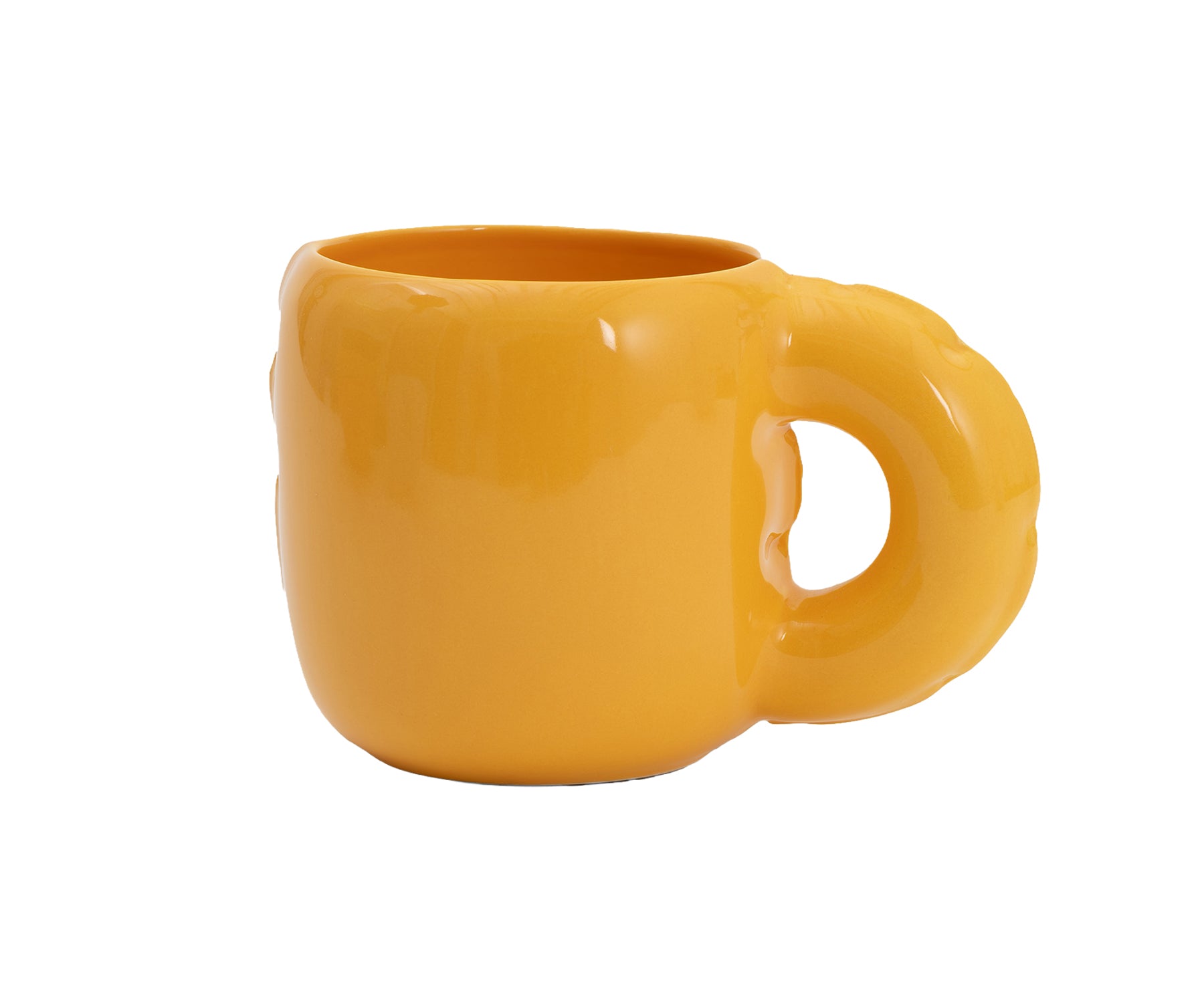 A glossy yellow ceramic Gaston Blow Up Mug by Home Studyo with a sculpted, organic handle and side details.