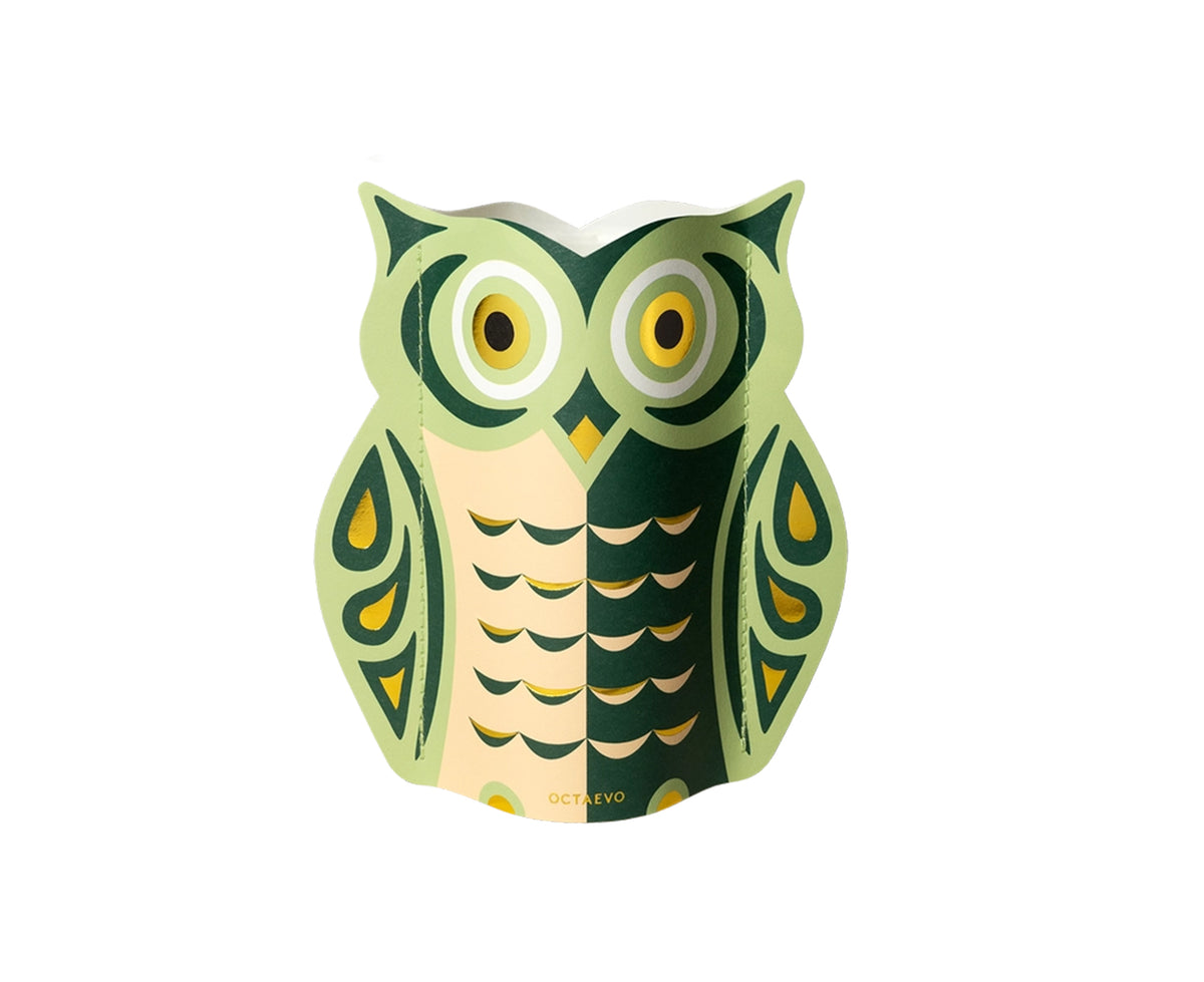An owl-shaped paper vase featuring a stylized graphic design in green, peach, and gold by Octaevo.