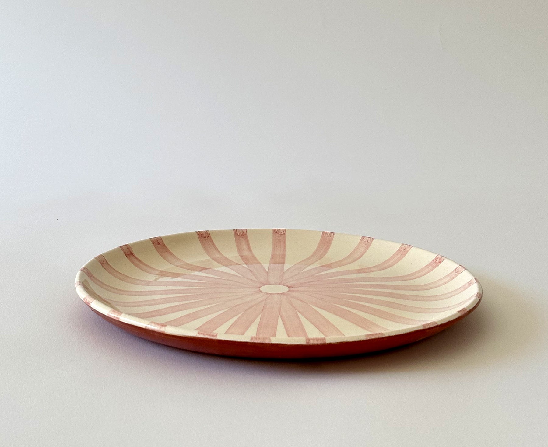 Ray Terracotta Dinner Plate in Pink by Casa Cubista