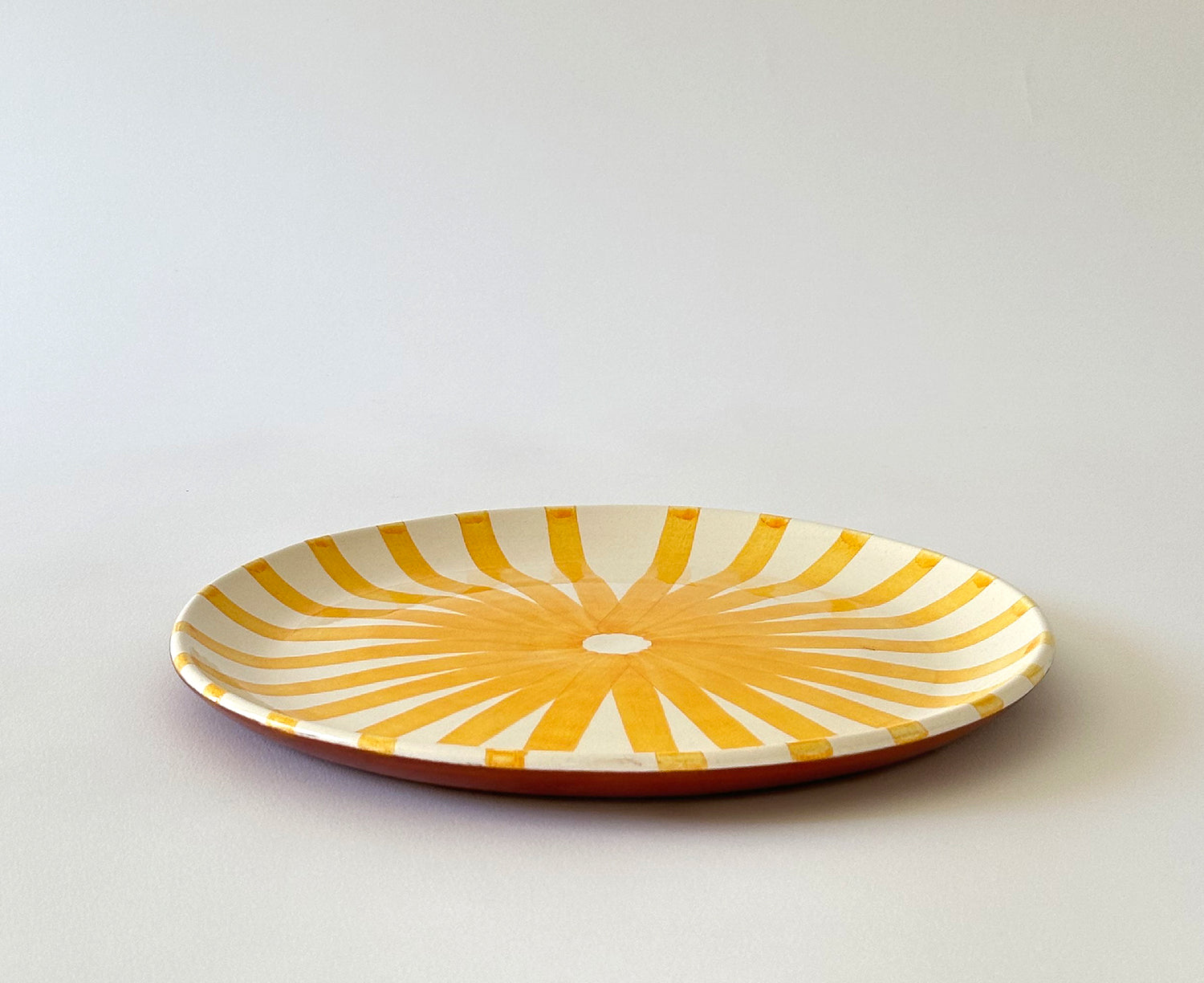 Ray Terracotta Dinner Plate in Yellow by Casa Cubista