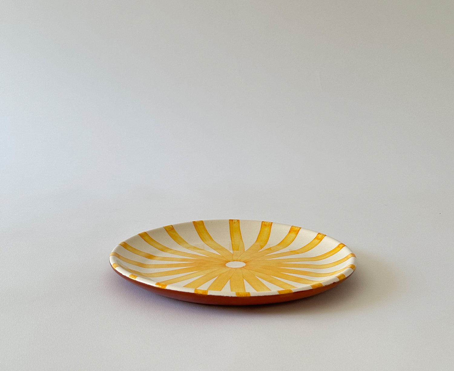 Ray Terracotta Salad Plate in Yellow by Casa Cubista