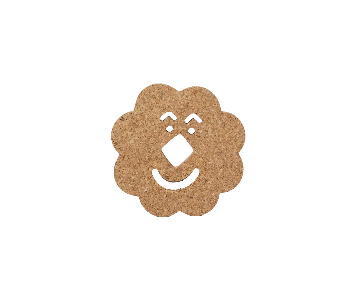 Flower shaped cork trivet by Wrap.