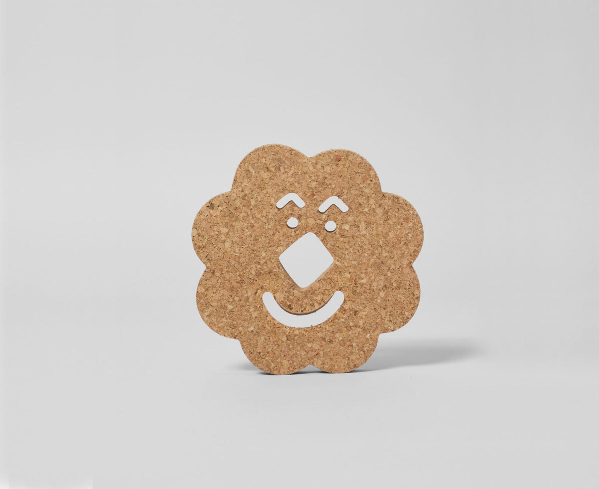 Flower shaped cork trivet by Wrap.